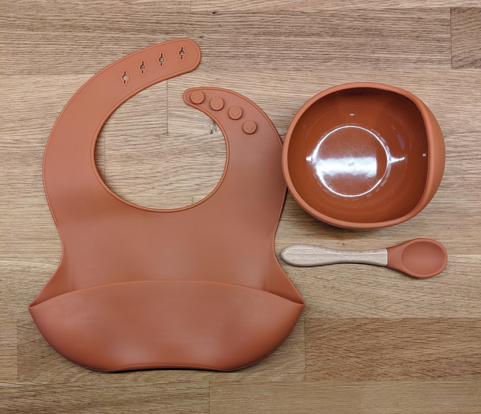 rust-and-silver-sage-silicone-suction-bowl-bib-and-spoon-set-wooden-spoon-713152