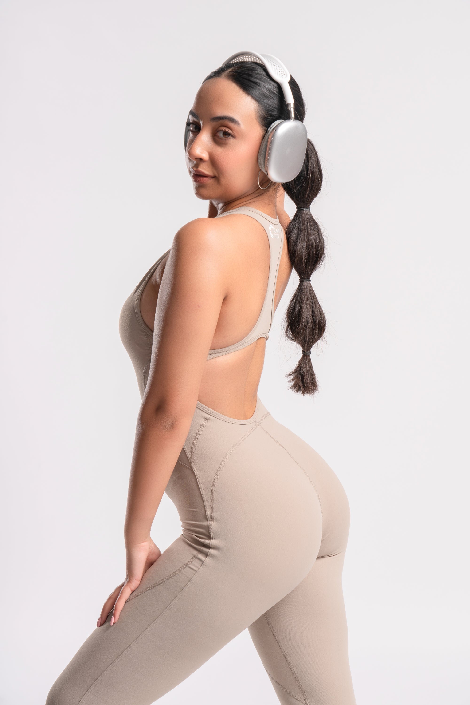 fitness-woman-beige-jumpsuit