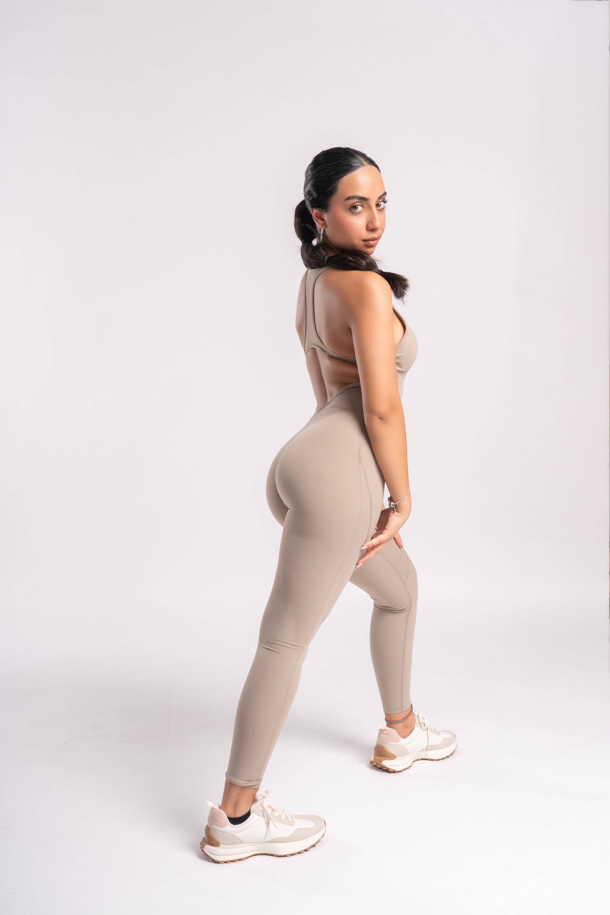 woman-beige-back-cut-out-onesie
