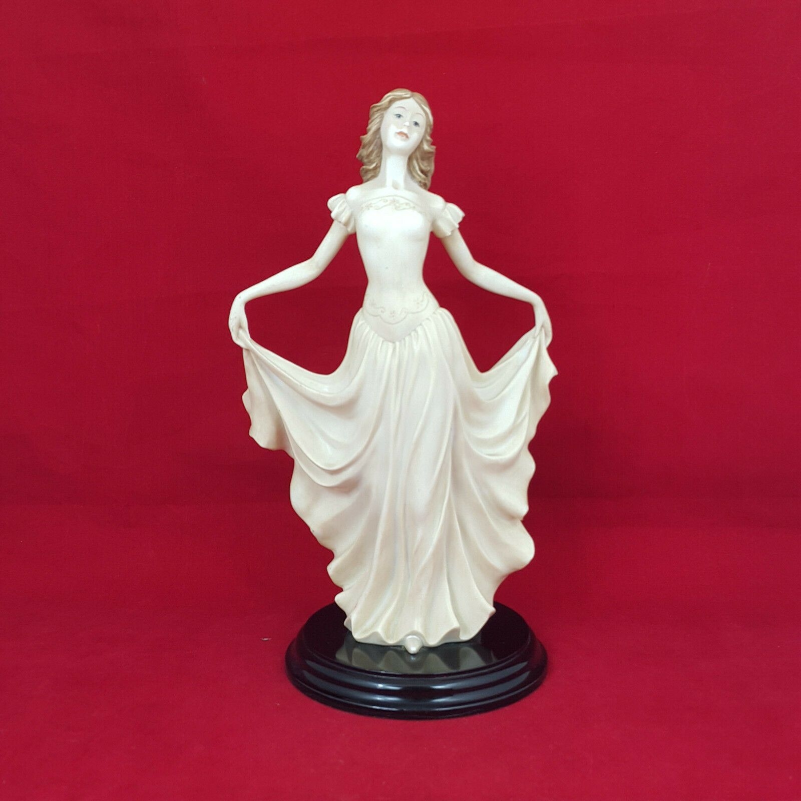The Leonardo Collection Figurine – Girl in Flaring Dress – 168 OA – Amazing Antiques Etc.