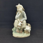 Lladro Figurine – A Young Girl with Fruit Basket and Doll 1211 DV – Lladró – Amazing Antiques