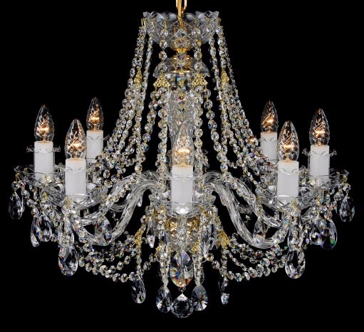 Eight light brass and crystal chandelier