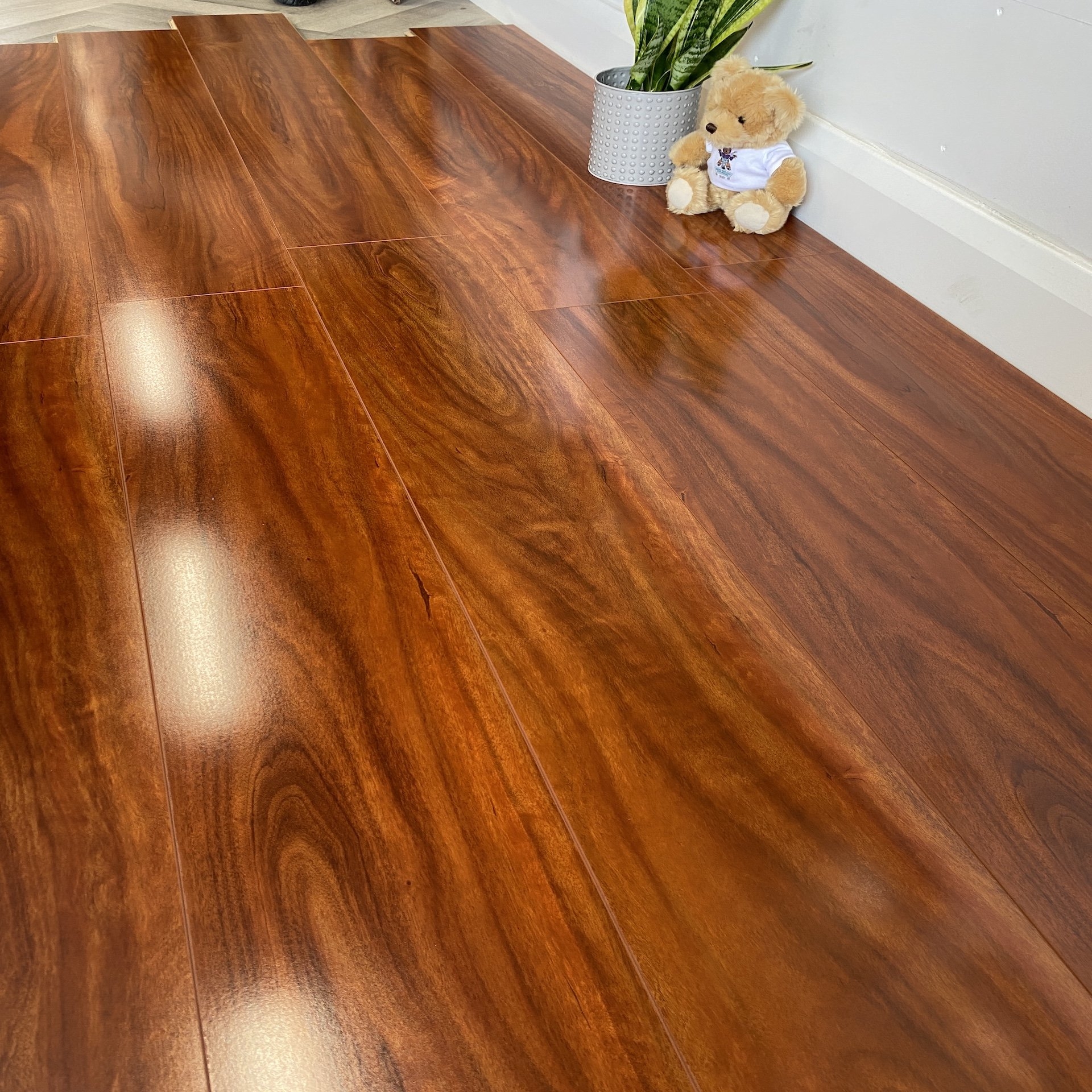 Rich Walnut Gloss Laminate – 12mm – Water & Scratch Resistant – Wood Floor Store