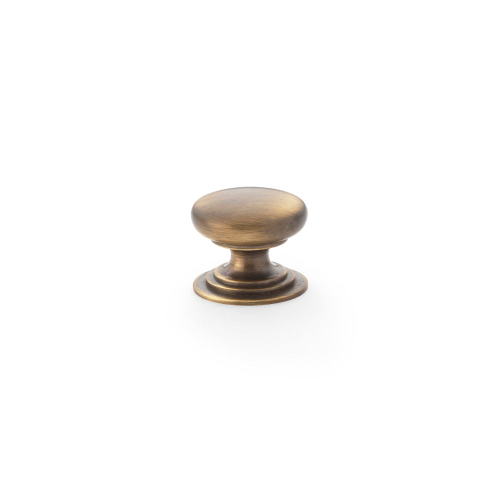 Round Brass Cupboard Knob on Stepped Rose, Antique Brass / 25mm by Bilden Home & Hardware Market