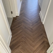 Mocha Oak Herringbone Laminate – 12mm – Water & Scratch Resistant – Wood Floor Store