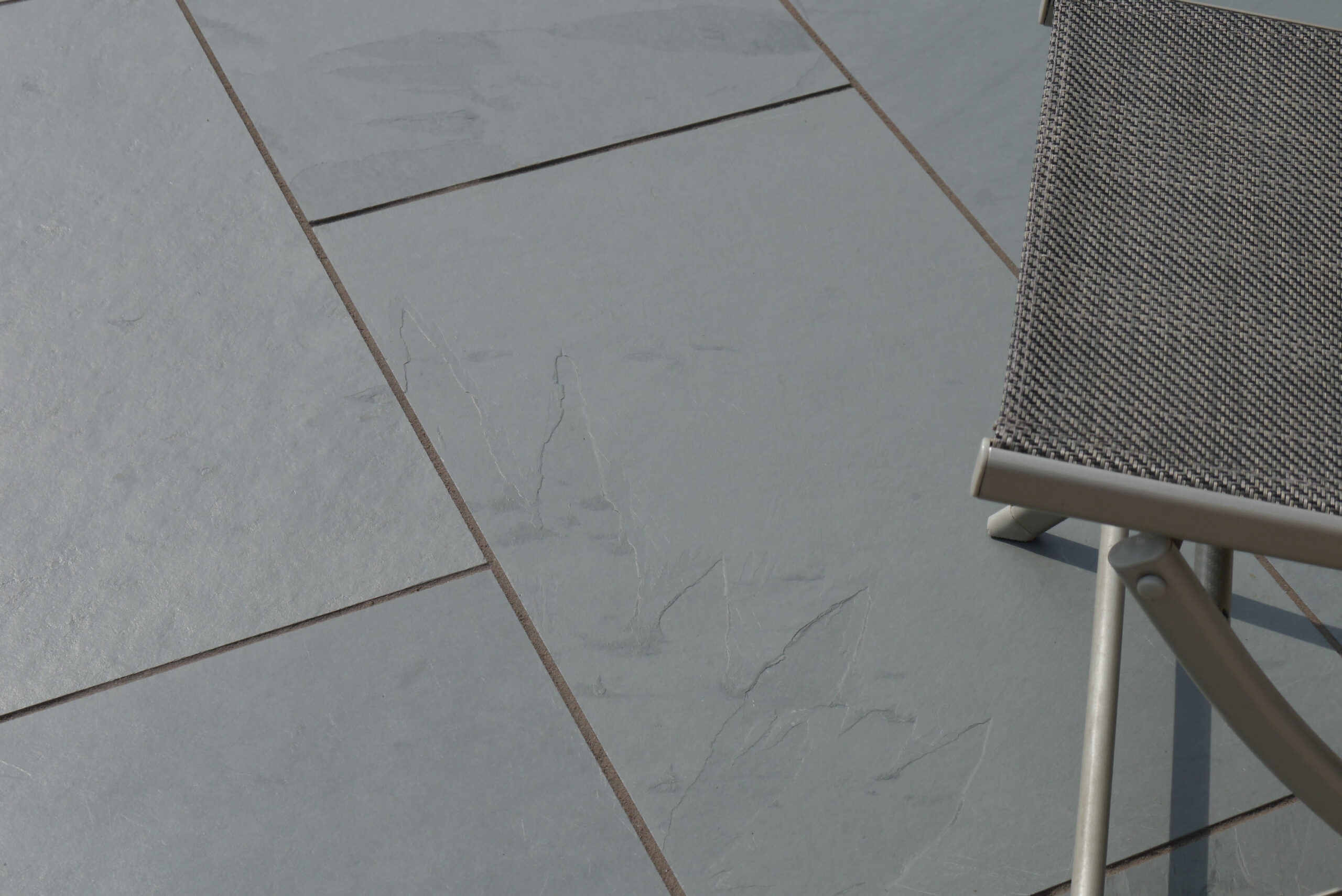 (Sample) – Brazilian slate grey machine-cut sides with riven top – Paving Slabs – Stone Traders