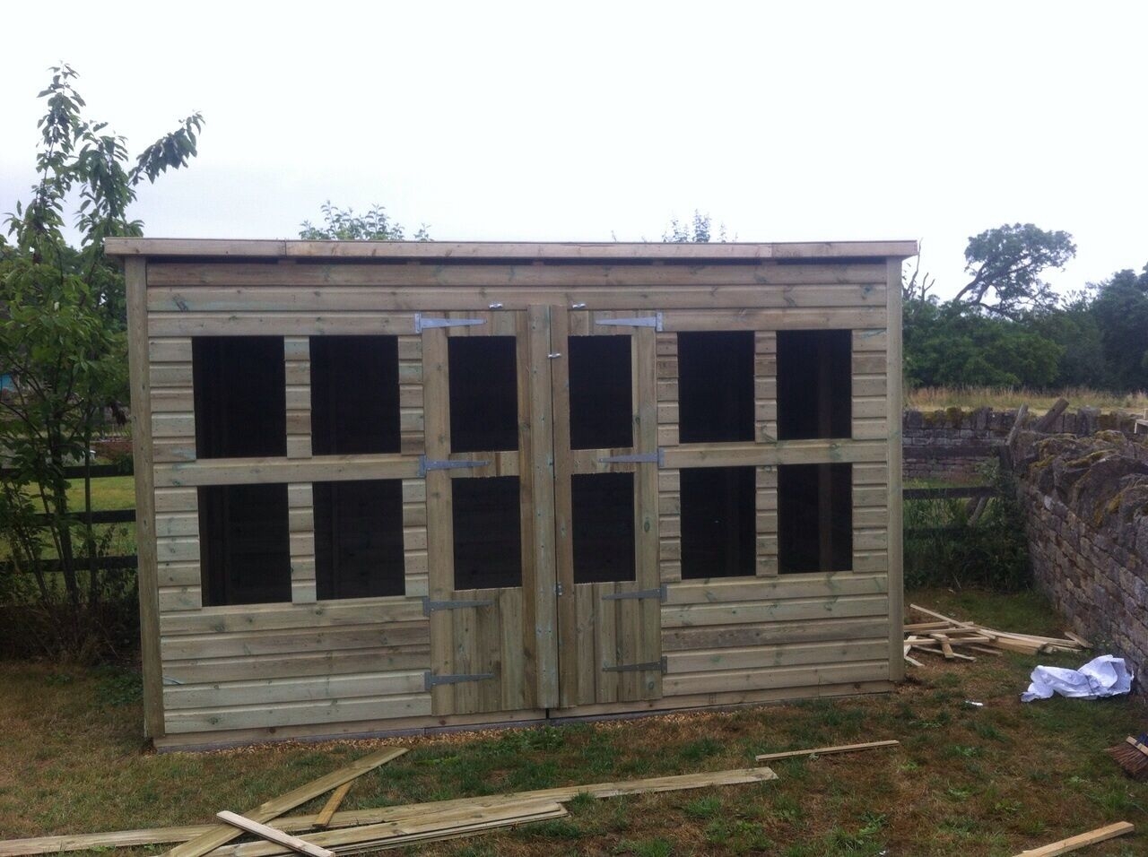 12 x 8ft Wooden Ultimate Garden Flat Roof Summerhouse 4’Double Door & 8 Fix Windows